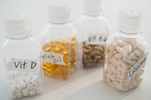 Studio shot of various pills in bottles