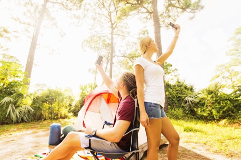 Couple looking for range on cell phone