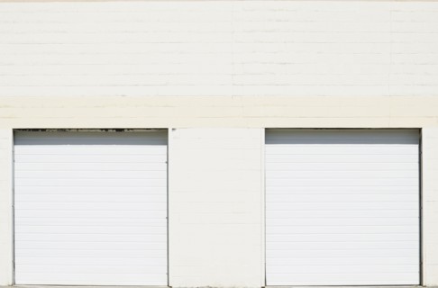 Close-up shot of closed roller doors of warehouse