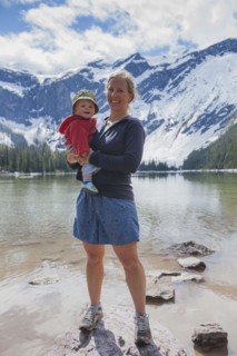 Woman with son (4-5) standing on lakeshore