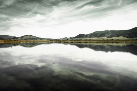 Landscape with mountain range and calm lake