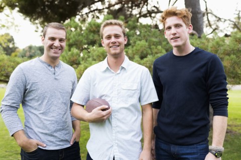 Portrait of young men with football