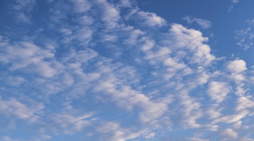 White clouds on blue sky.