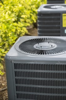 Air conditioning unit in garden.