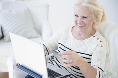 Senior woman doing on-line shopping
