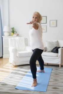Portrait of senior woman doing yoga