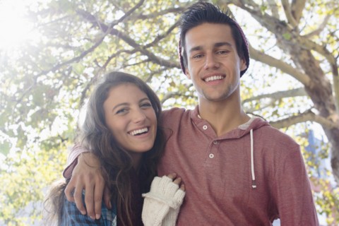 Portrait of young couple outdoors