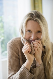 Portrait of woman wearing sweater