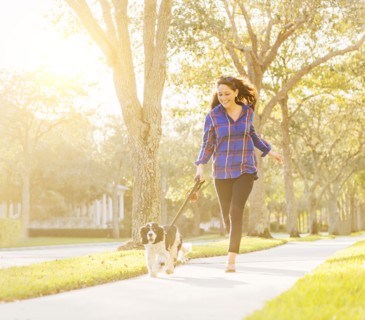 Woman running with her dog