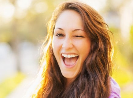 Portrait of winking woman
