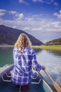 Woman canoeing in lake