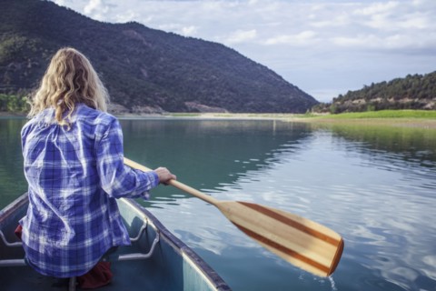 Woman canoeing in lake