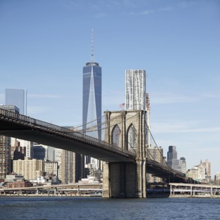 View of suspension bridge and cityscape
