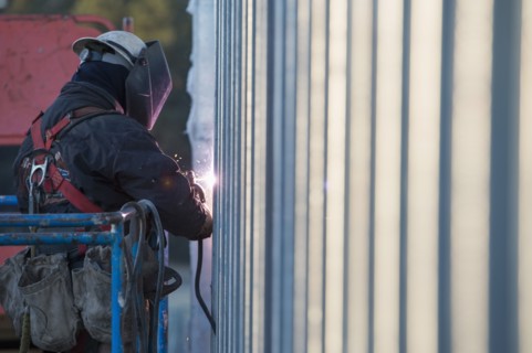 Man welding steel bar