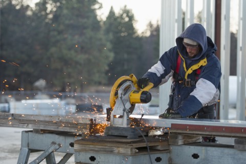 Man cutting steel bar