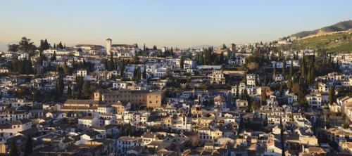 Townscape and hill in sunlight