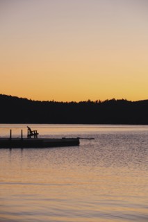 Jetty on lake at dawn