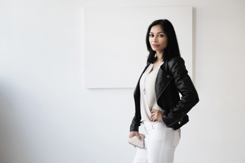 Portrait of young woman in studio.