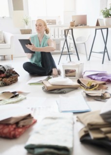 Fashion designer working in studio.