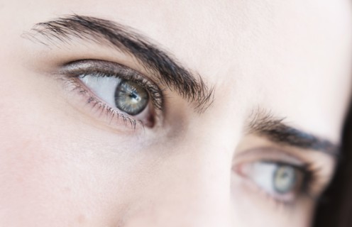 Portrait of young woman with blue eyes.