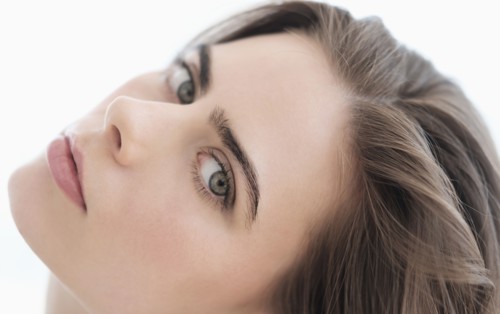 Portrait of attractive young woman .