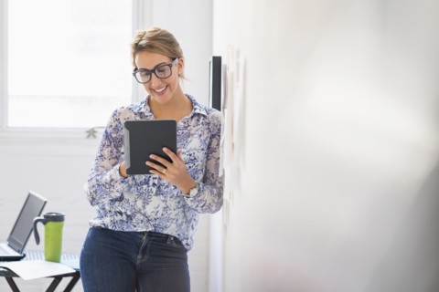 Young woman working in office.