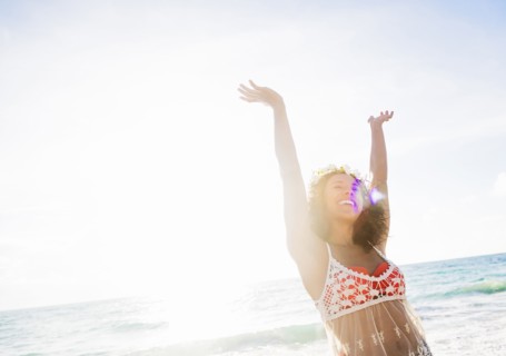 Young woman smiling on beach