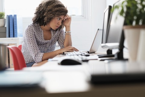 Young woman working at office.
