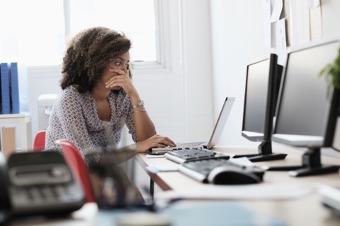 Young woman working at office.