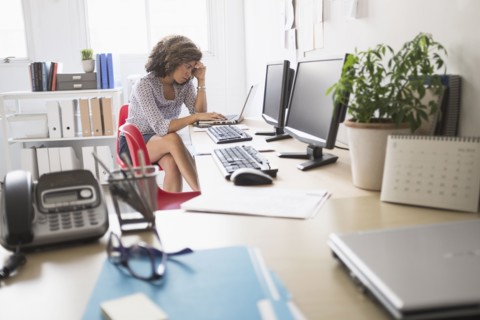 Young woman working at office.