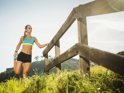 Woman stretching outdoors