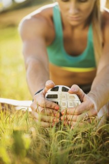 Woman exercising in field