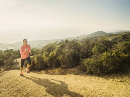 Woman running in mountains
