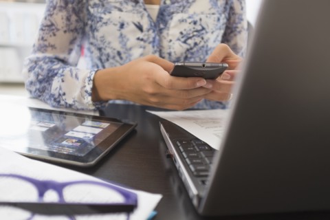 Young woman working in office.