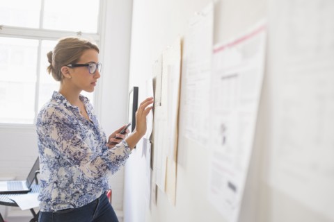 Young woman working in office.