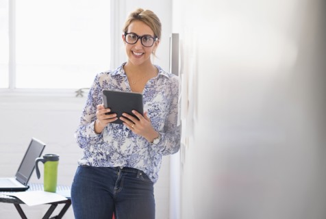 Young woman working in office.