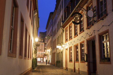 View along illuminated old town street