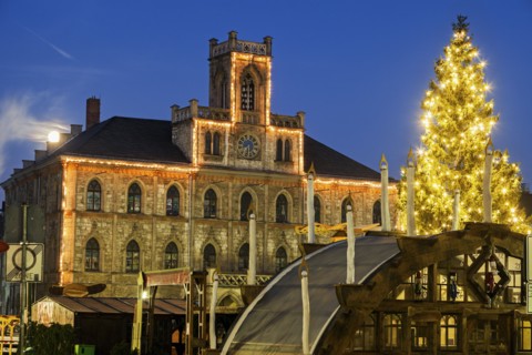 Illuminated Christmas tree and town hall