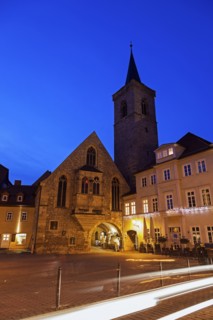 Illuminated old town buildings