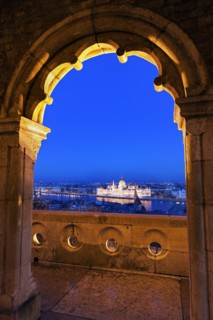 Hungarian Parliament seen through arch of Fisherman's Bastion