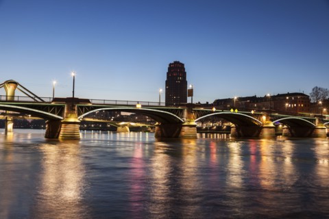 Ignatz-Bubis Bridge illuminated at dusk