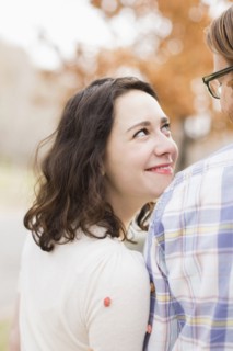 Smiling couple looking at each other