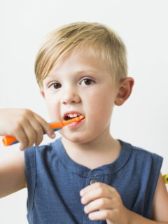 Little boy (2-3) brushing teeth
