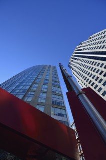 Low-angle view of glass skyscraper