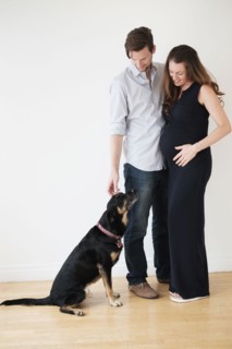 Portrait of couple with dog.