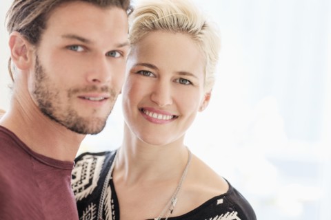 Portrait of couple outdoors.
