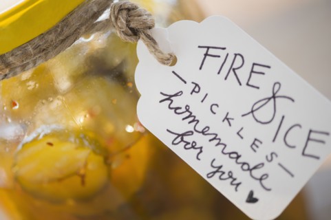 Jar with spicy pickles and hand written tag