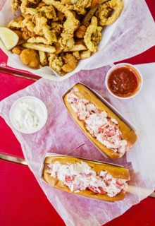 View of lobster meal on red
