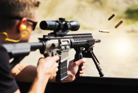 Man shooting rife