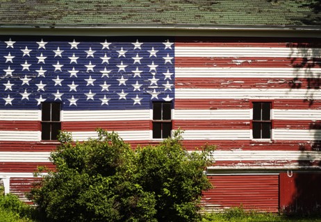 American flag painted on facade of barn